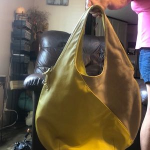 This is a bright yellow and tan bag